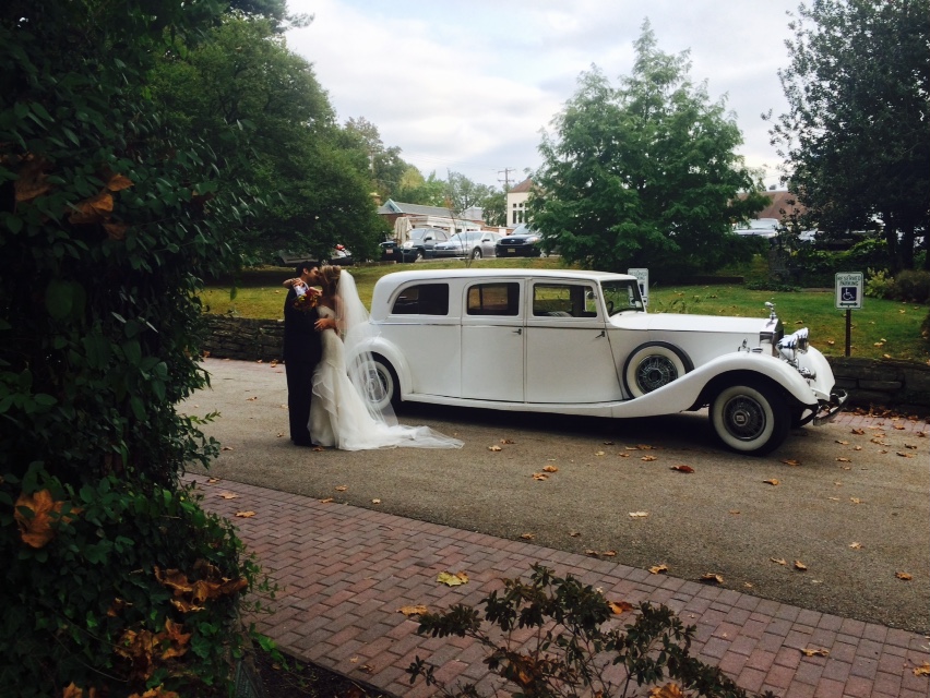 Romance of Happy couple in Antique Rolls Royce